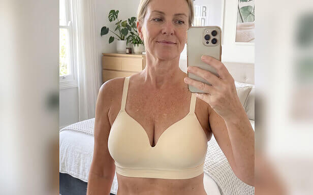 Customer wearing Shapermint cream bra