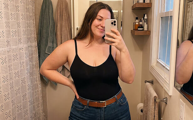 Customer wearing Shapermint black shapewear top