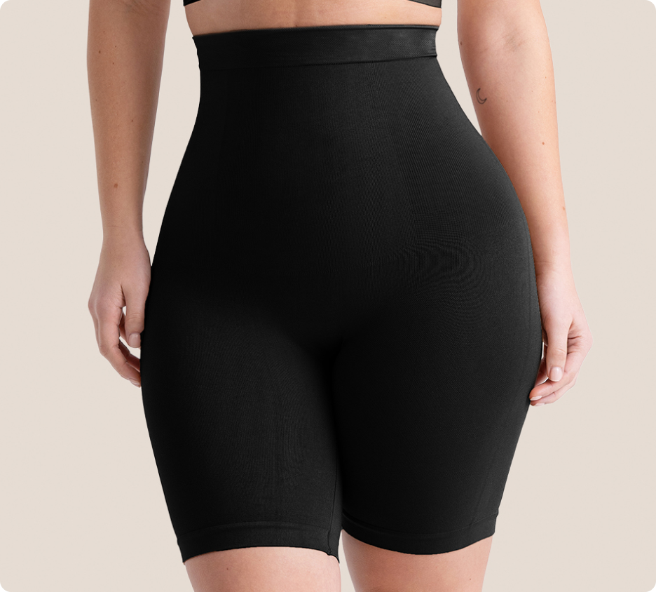 Model wearing high-waisted shaping shorts