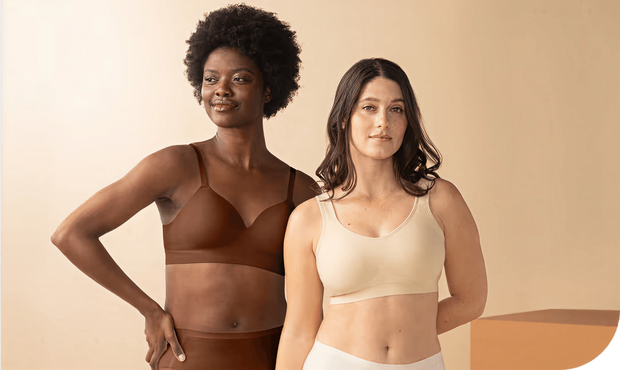 Two women wearing Truekind bras